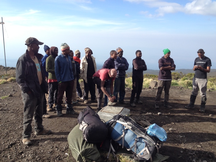 Here are most of our team of porters on the last morning, getting ready to load up and make the last of the twelve miles to home.